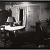 Interior view with table, chests of drawers and cabinets