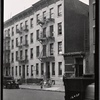 Remodeled tenement row; junk shop