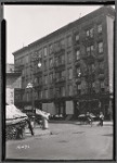 Tenements & storefronts; Cut Rate Bakery: Monroe St.-Rutgers St., Manhattan