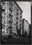 Tenements, some boarded up; residents: Manhattan