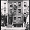 Row houses; man and child on stoop