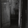 Outhouse interior with "Clean Hands" sign