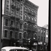 Tenements & storefronts; Scandron's Opticians: 399-403 Grand St.-Clinton-Suffolk, Manhattan