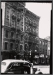 Tenements & storefronts; Scandron's Opticians: 399-403 Grand St.-Clinton-Suffolk, Manhattan