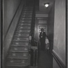 Interior stairwell; inspector with child