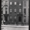 Brick row houses with ornamental iron work