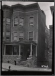 Three story row house with porch