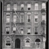 Row houses with store in first floor apartment