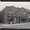 Row houses & storefronts; Sam's Confectionery: 107th Ave.-93 St.-94 St., Queens