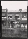 Two story row with stores; Block Island Food Store: 133-13 [street unknown], Queens]