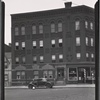 Small apartment building; Pete's Barber Shop (P. J. Sperlong?): 1207 Jackson Av-47th Rd-48th Av, Queens 