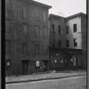 [Vacant tenements and storefront: Brooklyn]