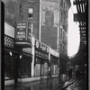 Strefronts & elevated train tracks; Checker Beverage Co, Sherbel's coats: 3112 [street unknown]]