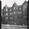 Queen Anne style row houses; children outside