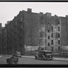 Vacant tenement row; playground; United Motors Service: W. 64th St.-Amsterdam-West End, Manhattan