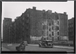 Vacant tenement row; playground; United Motors Service: W. 64th St.-Amsterdam-West End, Manhattan