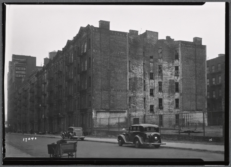 Vacant tenement row; playground; United Motors Service: W. 64th St ...
