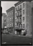 East Harlem tenement row with campaign signs for Lanzetta & Marcantonio: Manhattan