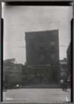 [Storefront with upstairs apartments; Henry's Auto Body Works: 710 [street unknown], Bronx?]