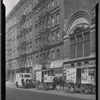 Tenement row; Borden's Milk trucks: 315-321 E. 103rd St-1st Av-2nd Av, Manhattan