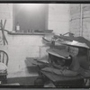 Garment workshop in apartment, with garment press