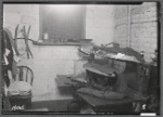 Garment workshop in apartment, with garment press