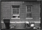 Apartment windows of Rev. H. A. Lipschitz, Marriage Performer