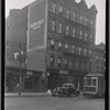Tenements & storefronts; Sun Roofing; trolley car: 2609-2617 3rd Av-E. 128th St., Manhattan
