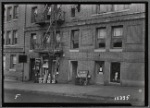 Apartment building, storefronts on ground floor; Bridge Mkt, Lea Lee Hairdressing: 831 W. 179th St.-Cabrini Blvd., Manhattan