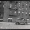 Apartment buildings; baby carriages parked out front: 1133 [street unknown], Bronx]