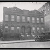 Two story brick row houses; Bicycles for hire: 1255-1257 [street unknown], Bronx]