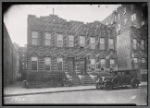 Two story brick row houses; Bicycles for hire: 1255-1257 [street unknown], Bronx]