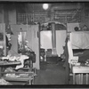 Interior view of tailoring workshop showing fire hazards: Manhattan