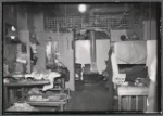 Interior view of tailoring workshop showing fire hazards: Manhattan