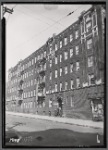 Apartment building with beauty shop on first floor; A & P store: Bronx