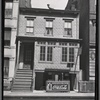 Three story house with grocery & meat market on ground floor