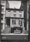 Three story house with grocery & meat market on ground floor