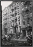 [Tenements & storefronts; Glass store, barber: 52 [street unknown]]