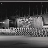 The Rockettes (background) and unidentified ice skaters (foreground) perform in the NBC-TV television special Rainbow of Stars
