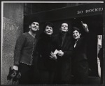 Robert Goulet and unidentified people during break in filming the NBC-TV television special Rainbow of Stars