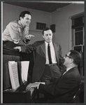 Director-choreographer Michael Kidd, book writer Leonard Gershe, and composer Harold Rome during rehearsal for the stage production Destry Rides Again