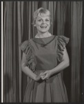 Dressed to the nines. [1961]
