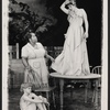 Johnny Doran [on floor], Theresa Merritt and Neva Small [on table] in the stage production F. Jasmine Addams