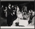 Bette Midler (center seated) and unidentified cast members in the stage production Fiddler on the Roof