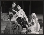 Roger Evan Boxill, unidentified actresses, and Avra Petrides (kneeling on floor) in the stage production The Golden Six