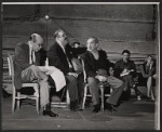 Zero Mostel [seated in center foreground], Sam Levene [seated at right foreground], Bill Becker [seated in background] and unidentified others in rehearsal for the stage production of The Good Soup