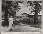 New House. Daughter of resettled farmer in foreground. Wolf Creek Farms, Ga