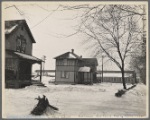 Manville, New Jersey. Garage in the foreground is the home of a white family, consisting of a man and wife.