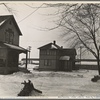 Manville, New Jersey. Garage in the foreground is the home of a white family, consisting of a man and wife.