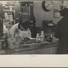 Interior of a grocery store showing the cheese and dairy counter